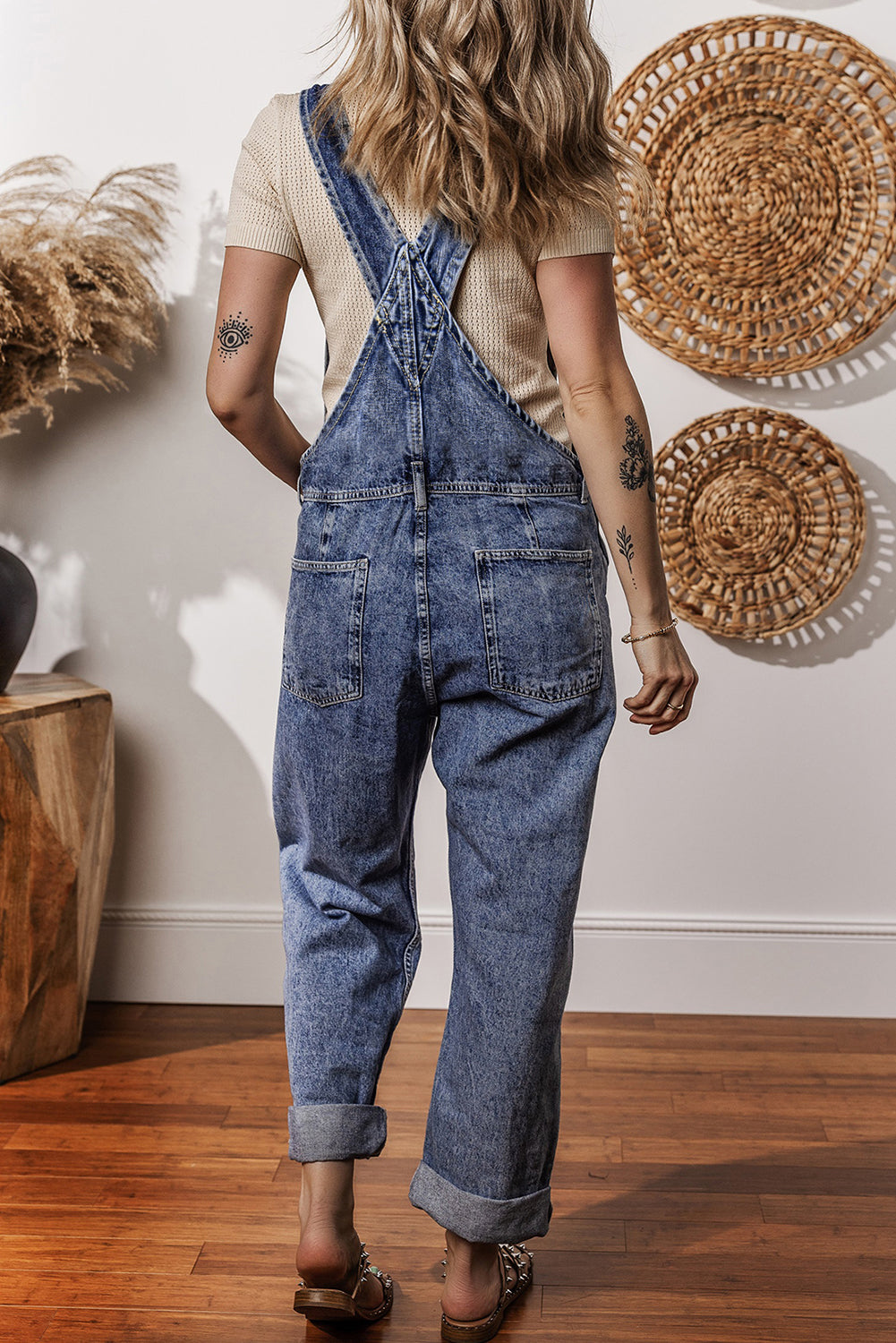 Sail blue denim bib jumpsuit with straight leg design and pockets, by Dear-Lover, shown on a model.