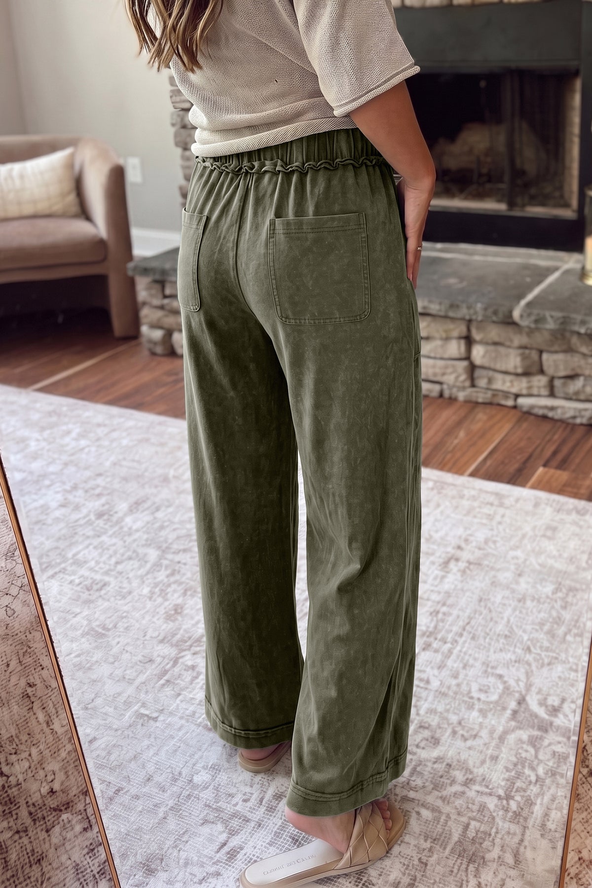 Jungle green cotton flare pants with seam details and drawstring waist from Dear-Lover, featuring mineral wash and casual style.