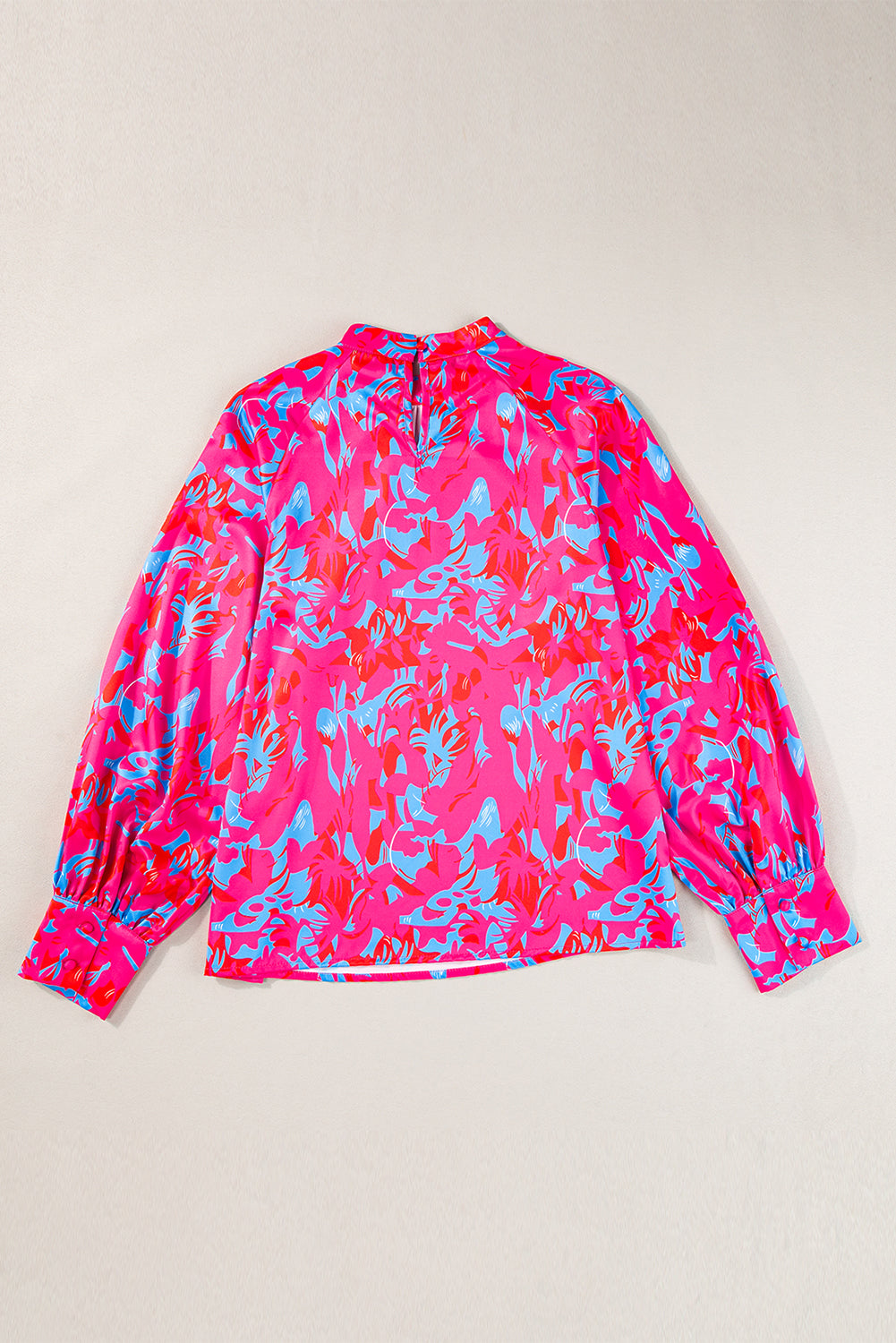 Purple printed bubble sleeve mock neck blouse by Dear-Lover, featuring stylish design and vibrant pattern, showcased on a model.