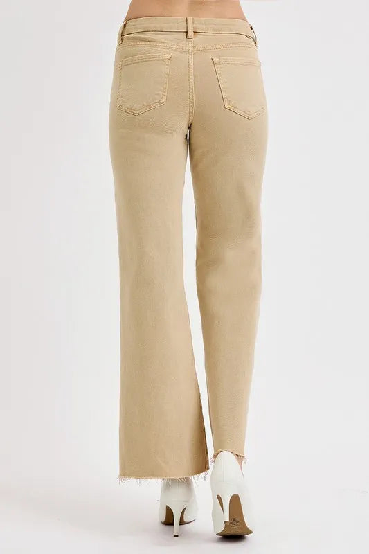 Plus size RISEN raw hem wide leg jeans by Trendsi, full size denim with relaxed fit and casual style, front view of the jeans.