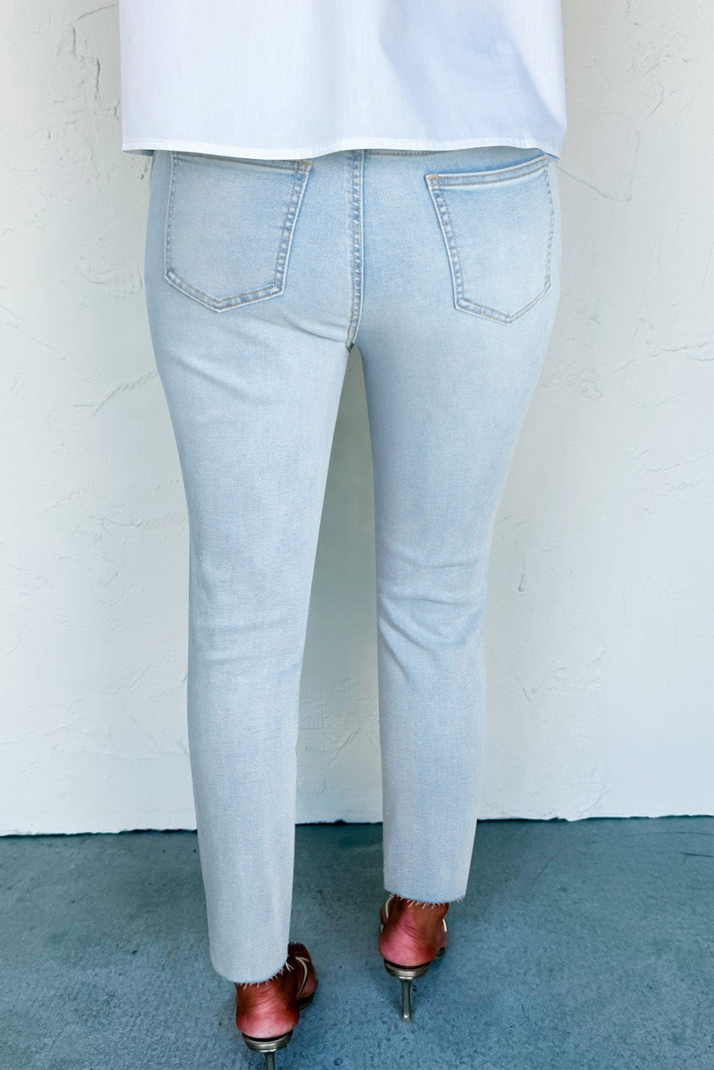 Beau Blue mid-rise ankle-length distressed skinny jeans by Dear-Lover, showing fitted denim with ripped details and casual style.