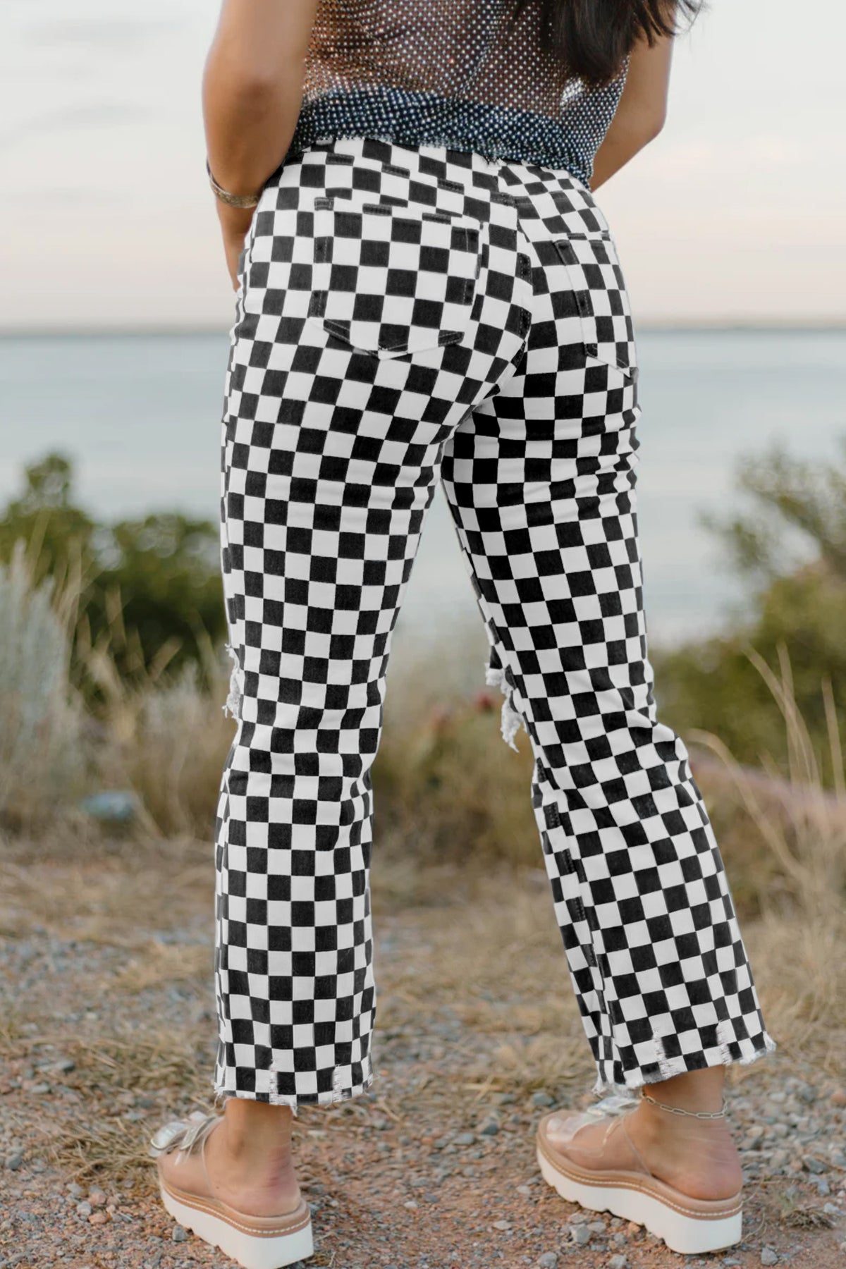 Black checkerboard print distressed raw edge cropped jeans from Dear-Lover featuring holes and a casual, trendy design.