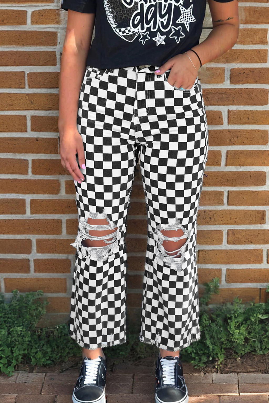 Black checkerboard print distressed raw edge cropped jeans from Dear-Lover with holes and frayed hems, stylish and trendy bottoms.