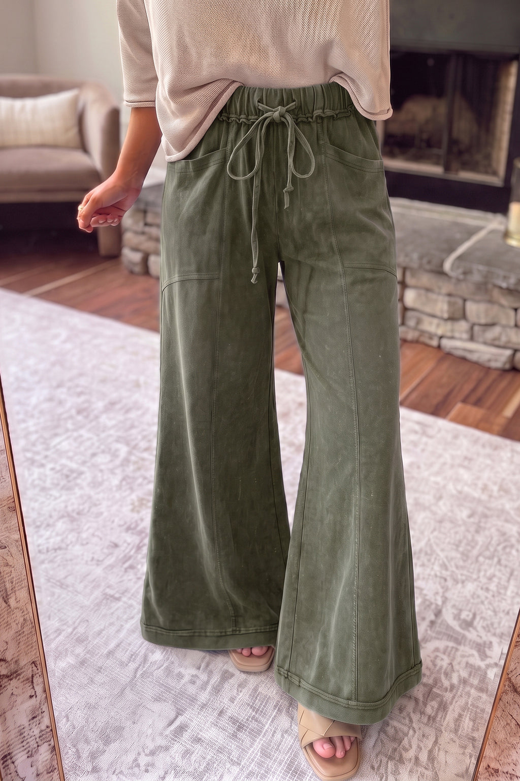 Jungle green Dear-Lover cotton flare pants with mineral wash finish, seam details, and drawstring waist, casual and comfortable.