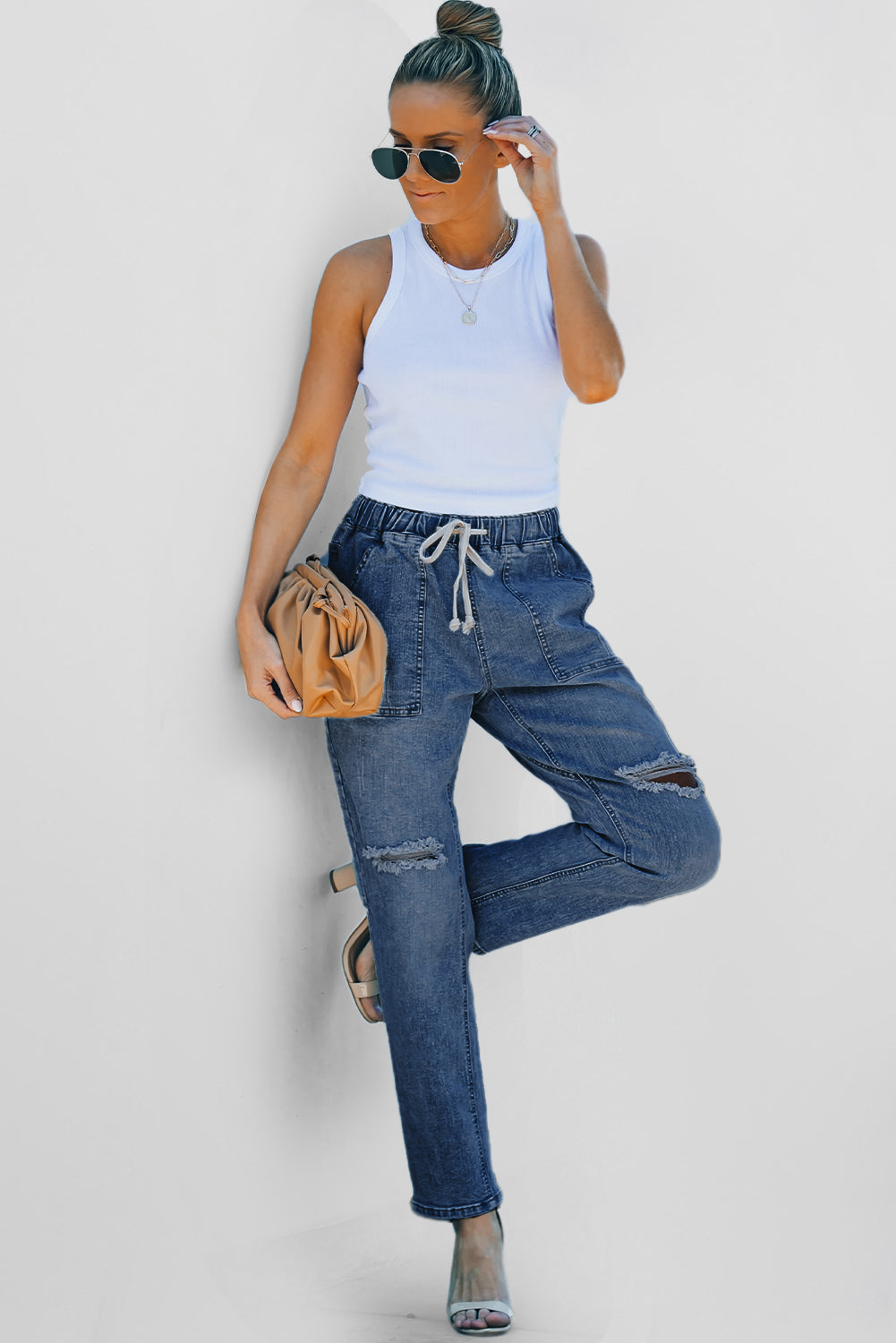 Dark blue distressed denim joggers with gathered round design and pockets from Dear-Lover, casual bottoms for relaxed style.