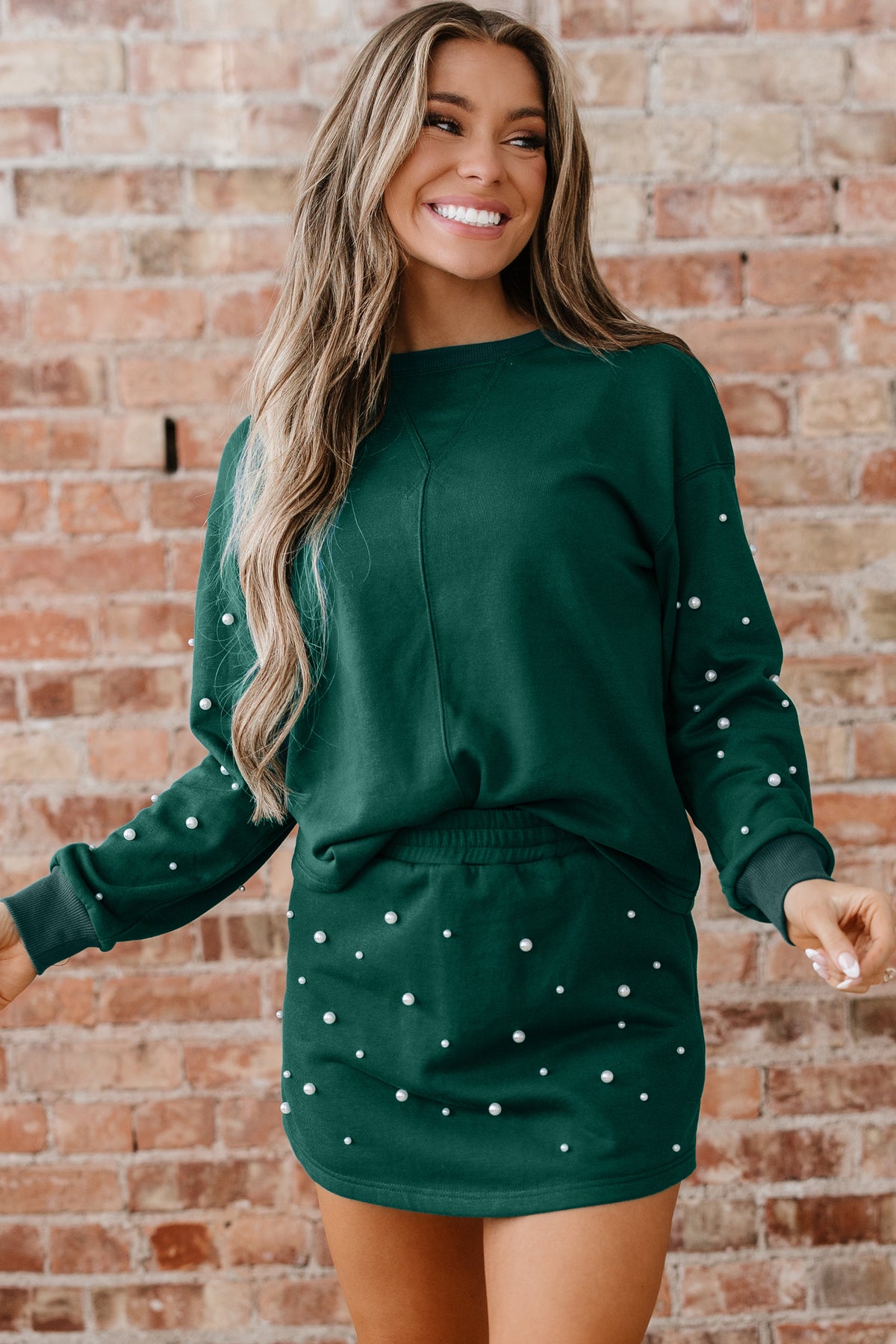 Dark green pearl-embellished drop shoulder pullover and elastic waist mini skort set by Dear-Lover, stylish two-piece outfit.