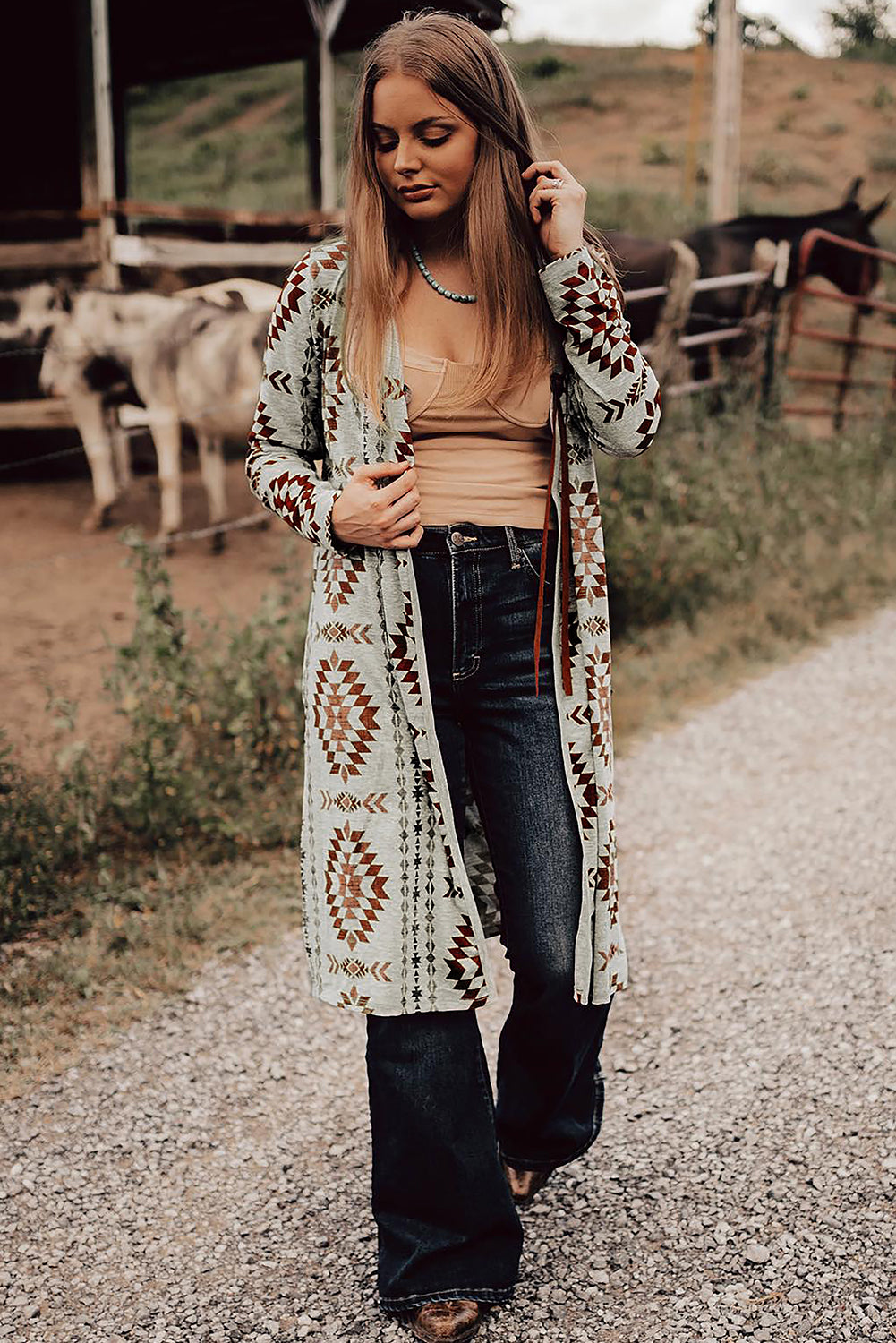 Sky blue Western Aztec printed open front long cardigan by Dear-Lover, featuring bold geometric patterns and lightweight fabric.