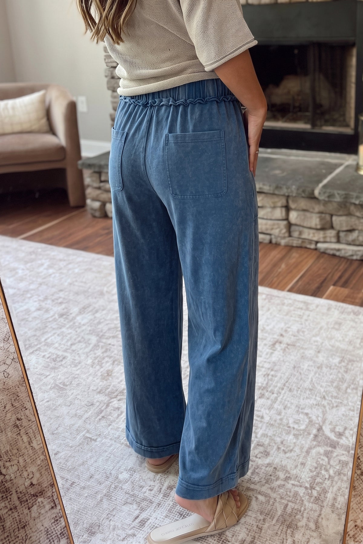 Jungle green cotton flare pants with mineral wash finish, seam details, and drawstring waist from Dear-Lover.