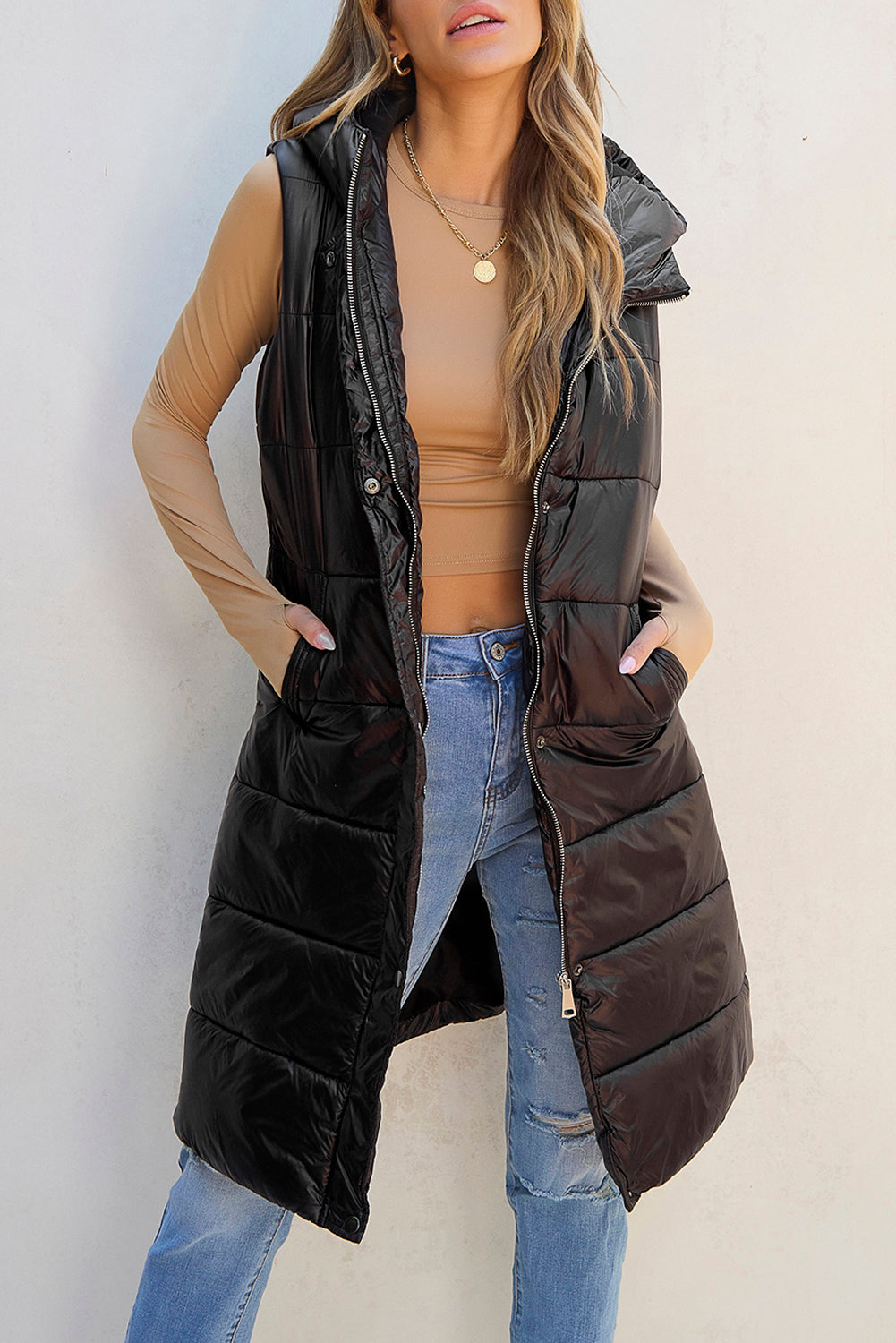 Black hooded long quilted vest coat by Dear-Lover, featuring a stylish padded design with a hood for warmth and comfort.