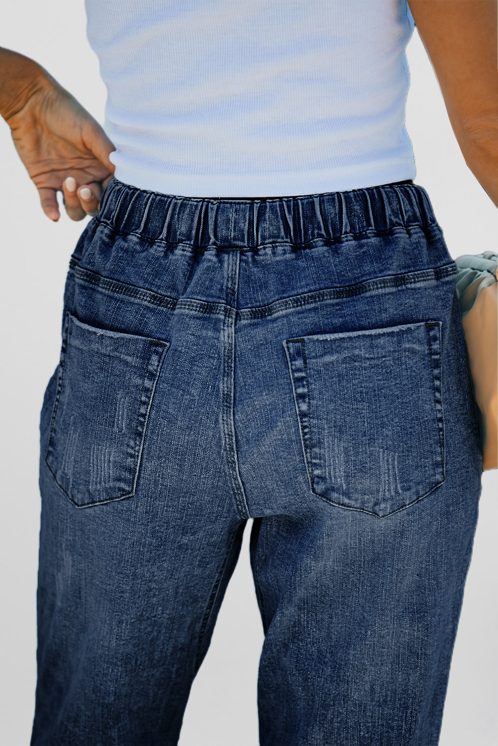 Dark blue distressed denim jogger with gathered round design and front pockets from Dear-Lover, showcasing a casual, stylish bottoms look.