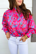 Purple printed bubble sleeve mock neck blouse by Dear-Lover, featuring a stylish design with a fitted silhouette and bold print.