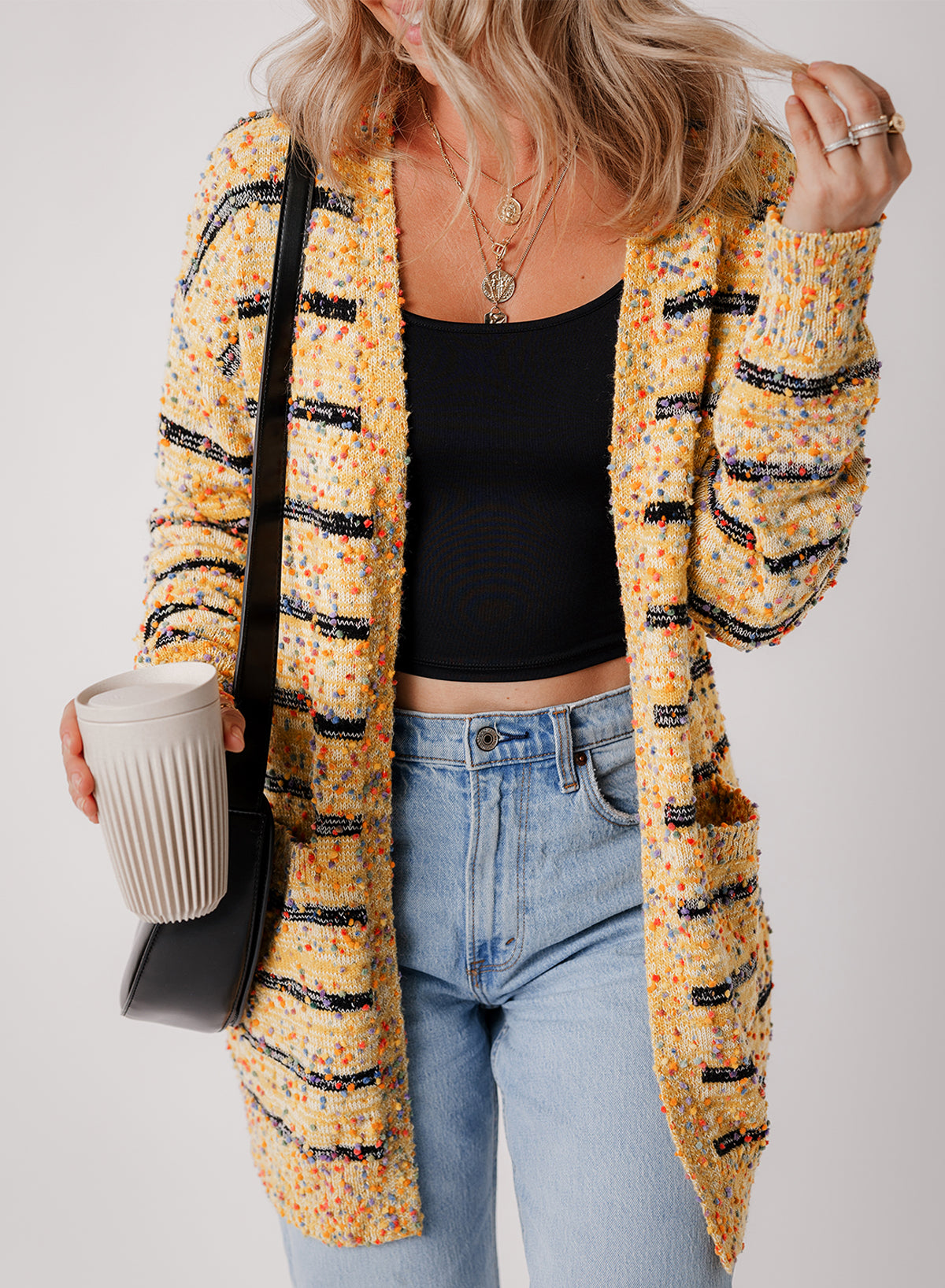 Beige striped pom-pom knit open-front long cardigan by Dear-Lover, featuring cozy knit fabric and playful pom-pom details.