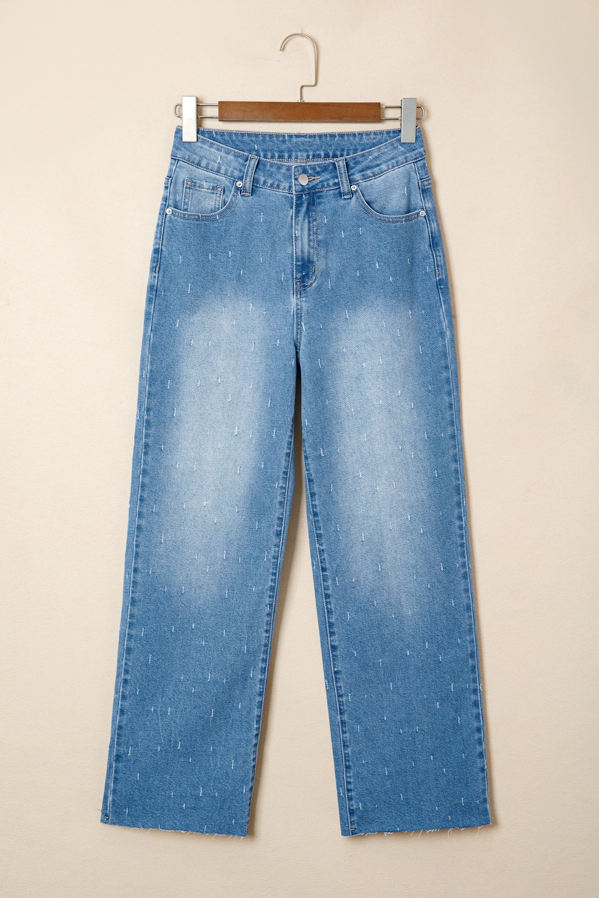 Mist Blue distressed detail tummy control raw hem jeans from Dear-Lover Dropshipping, showing close-up of the distressed raw hem and fit.
