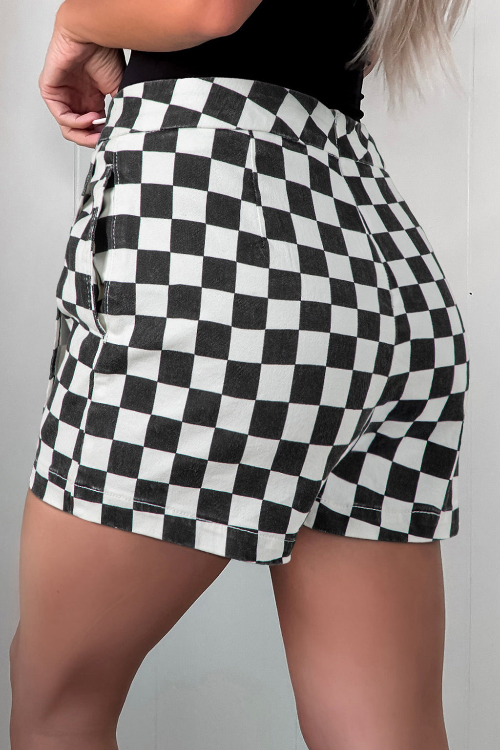 Black checkered print denim shorts with overlap style, casual bottoms from Dear-Lover, featuring a trendy, relaxed fit.