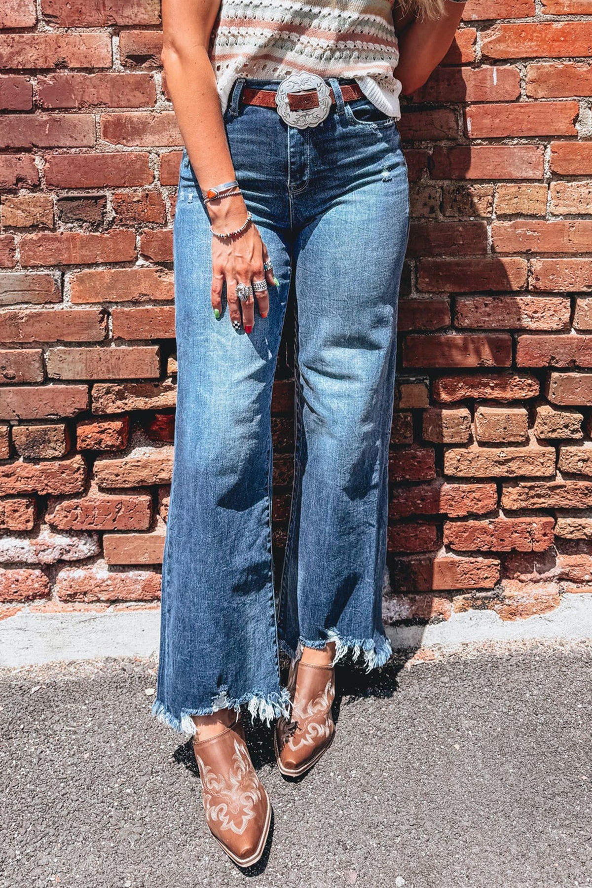 Blue high waist flare jeans with frayed hem from Dear-Lover, featuring a stylish fit and distressed detailing.