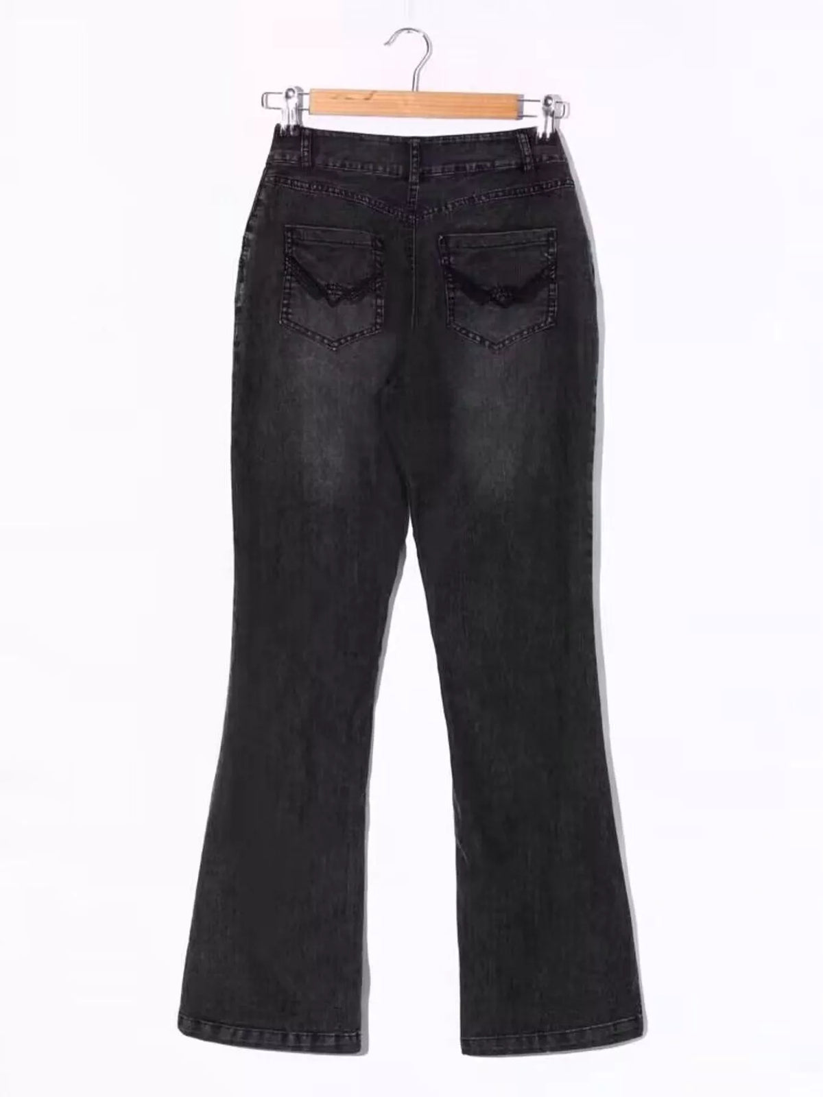 Mid-rise bootcut jeans by Trendsi featuring classic denim fabric, fit details, and a stylish silhouette.