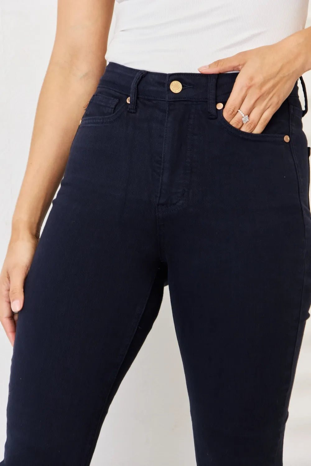 Full view of Judy Blue full size garment dyed tummy control skinny jeans with a high-rise waist and classic denim wash.