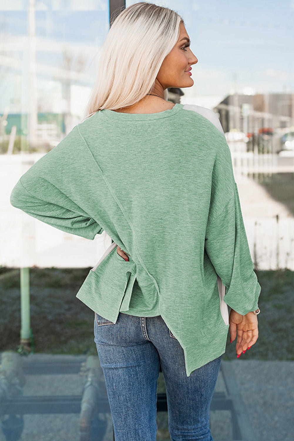 Colorblock stitching irregular hem long sleeve top by Dear-Lover, featuring contrasting colors and unique design details.