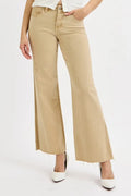 Plus size RISEN raw hem wide leg jeans by Trendsi, showing the full length denim with distressed hem and relaxed fit.